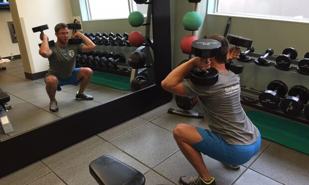 James Demonstrating Dumbbell Shoulder Squat