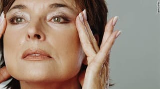 Woman Rubbing head